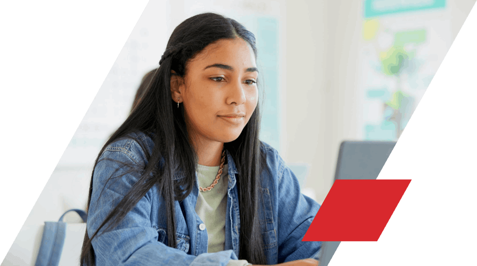 Female student using laptop